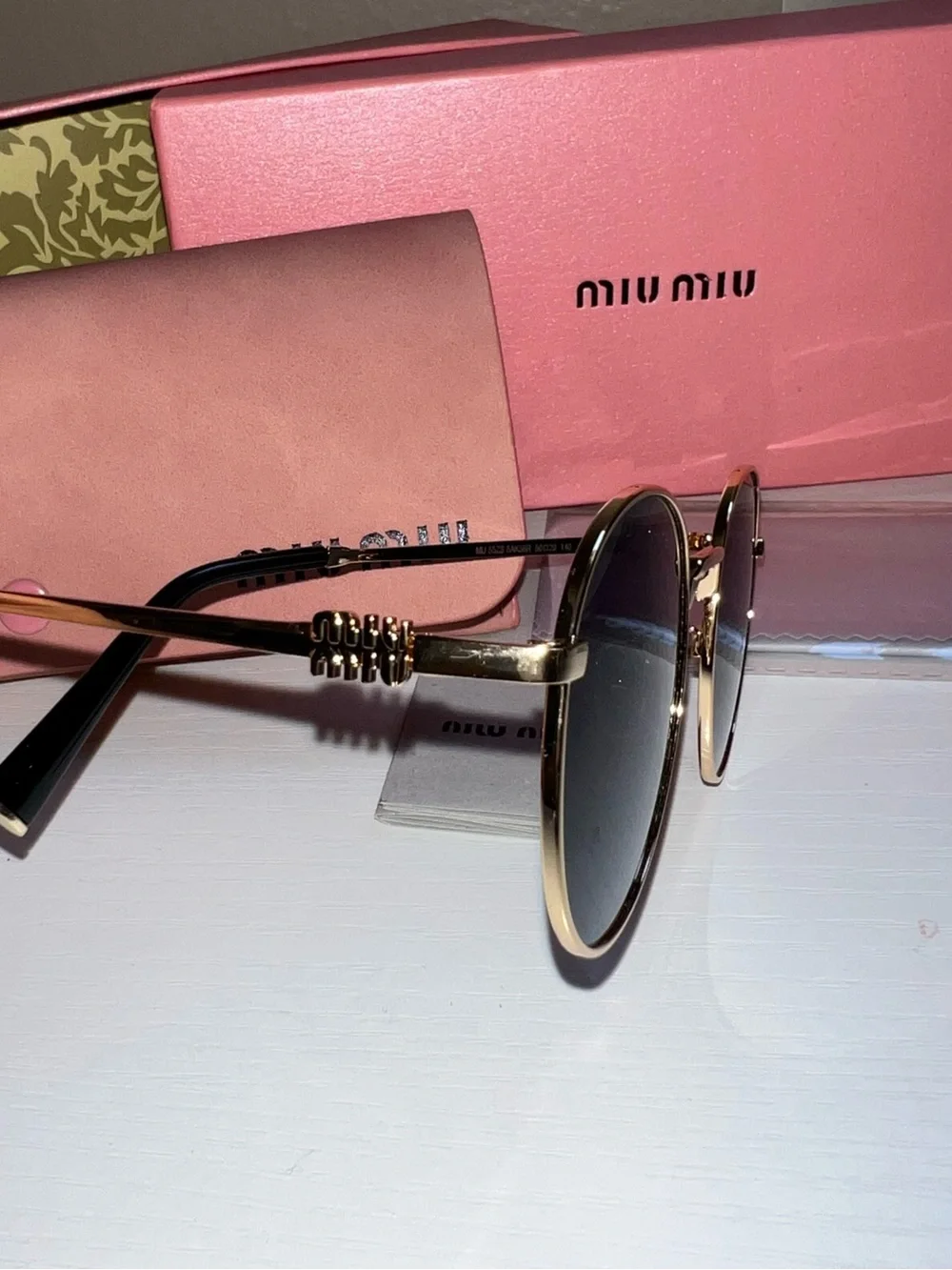 Miu Miu Gold Metal Round Sunglasses with Black Lenses